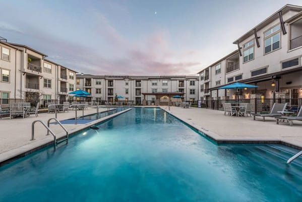 Pool area with building exterior in the background