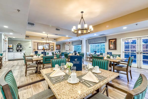Dining area with tables set for a meal