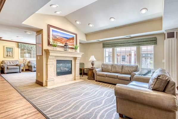 Cozy common area with seating and fireplace