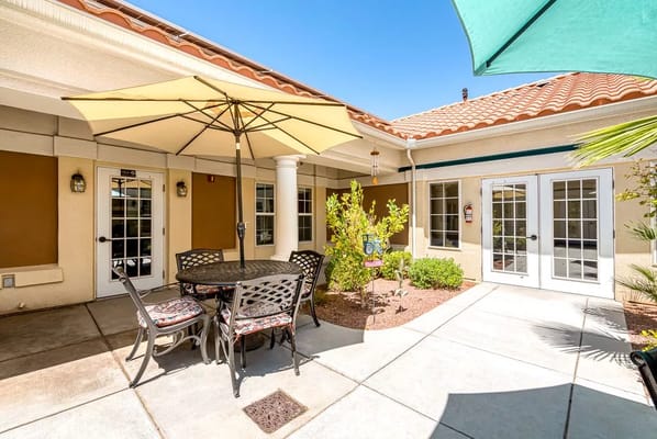 Outdoor seating area with umbrellas and tables