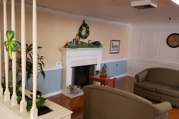 Cozy common area with seating and fireplace