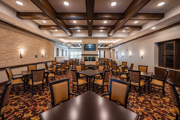 Interior view of a dining area with tables and chairs
