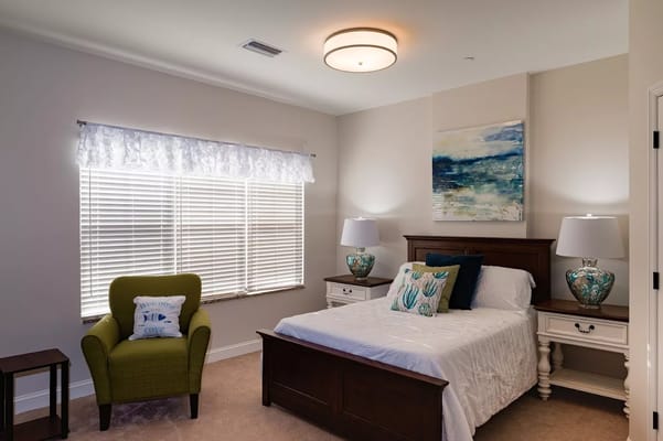 A well-designed private resident bedroom with cozy decor