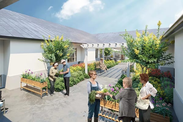 Residents engaging in gardening in a vibrant outdoor space