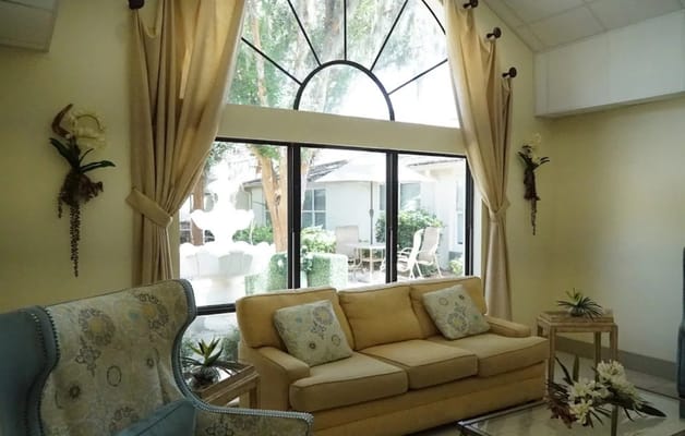 Interior common area with seating and large windows