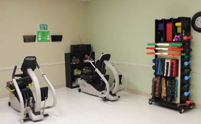 Interior view of a fitness area with exercise equipment