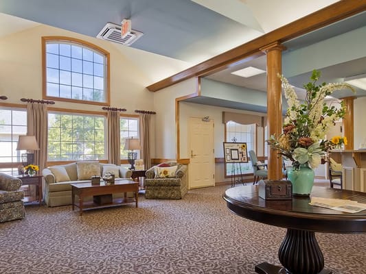 Cozy lobby area with seating and large windows