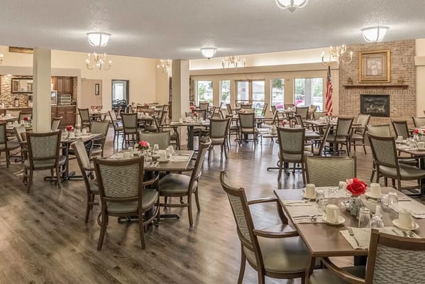 Dining area with tables set for meals