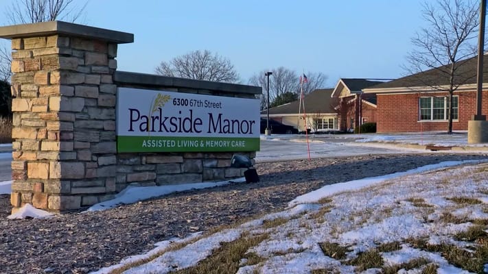 Entrance sign for Parkside Manor assisted living facility