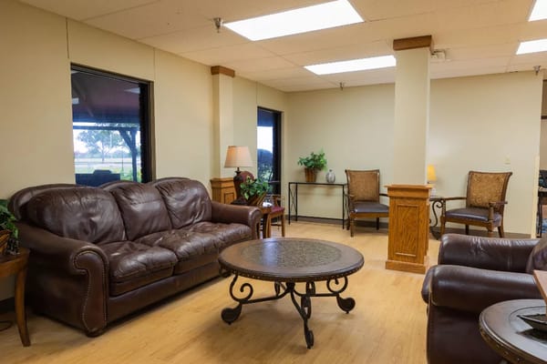 Cozy common area with seating and natural light