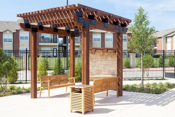 Outdoor pergola with seating area