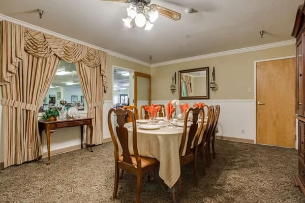 Dining room setup with elegant table settings