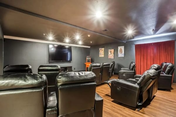 Interior view of a movie theater room with seating
