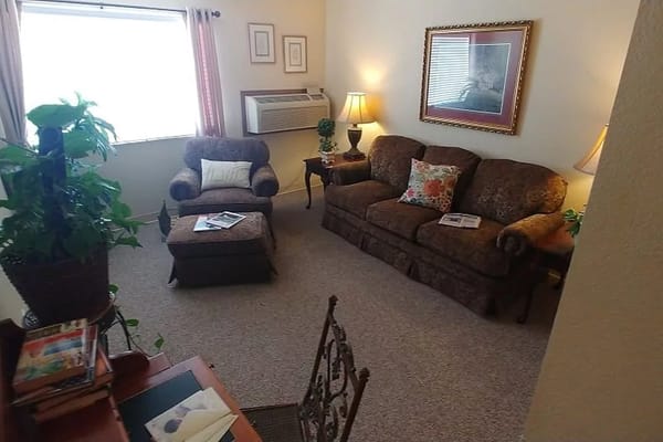 Cozy living room in a resident's suite