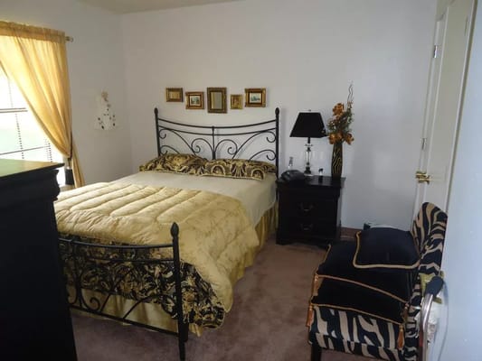 A cozy private resident room with decorative furniture