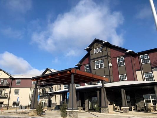 Exterior view of Pelican Landing with an entrance