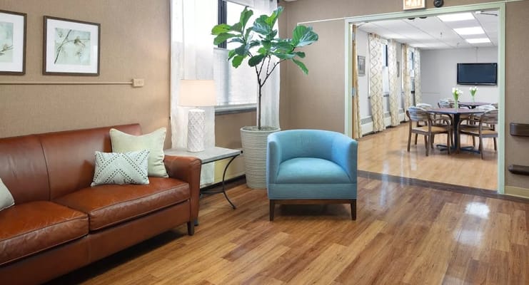 Comfortable common area with seating and plants