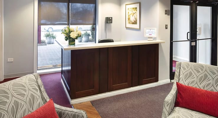 Reception area with a welcoming desk and seating