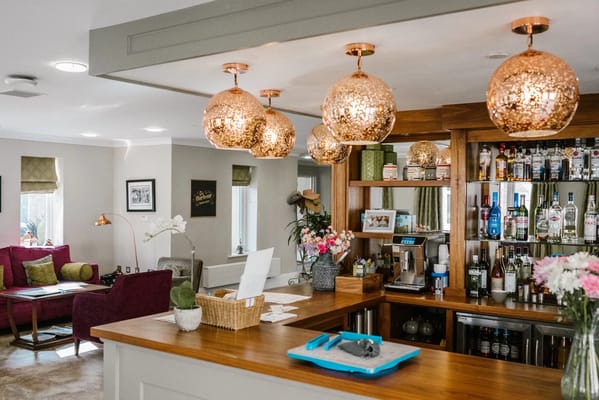 Interior bar area with decorative lighting and seating