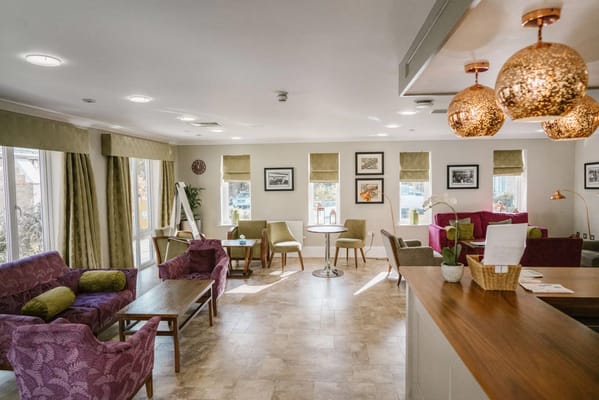 Bright common area with seating and decor