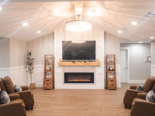 Cozy common area with seating and fireplace