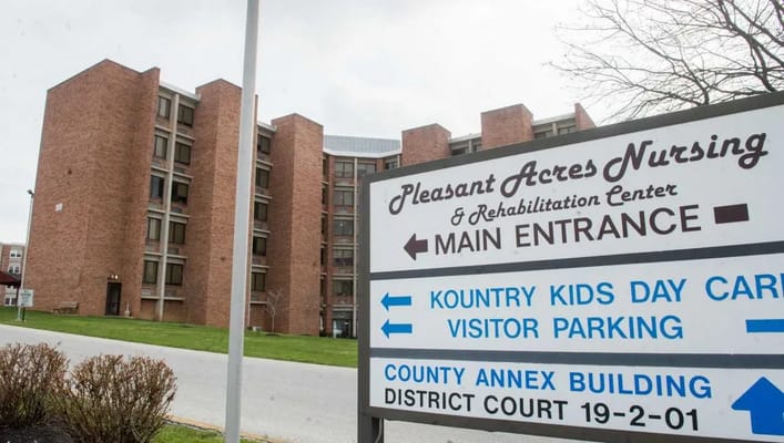 Building exterior and main entrance of Pleasant Acres Nursing