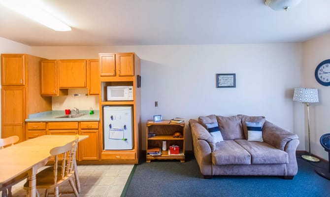 Cozy interior of a resident room with dining area