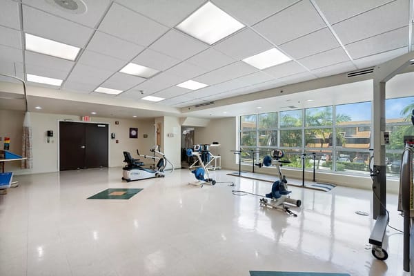 Interior view of a rehabilitation gym with exercise equipment