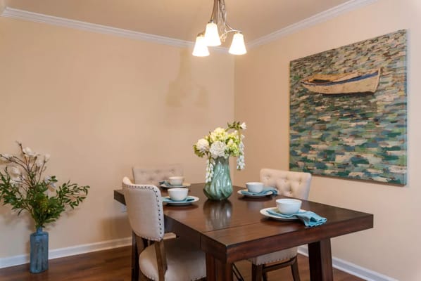 Cozy dining area with a table set for meals