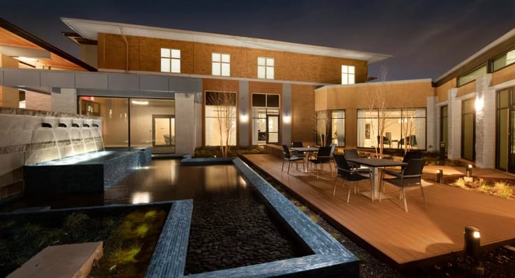 Outdoor courtyard with seating and water features