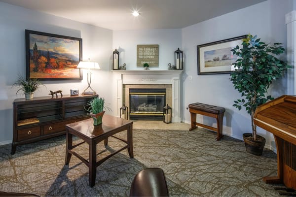 Cozy common area with fireplace and comfortable seating
