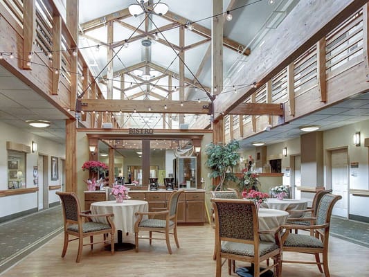 Interior view of a dining area with tables and chairs
