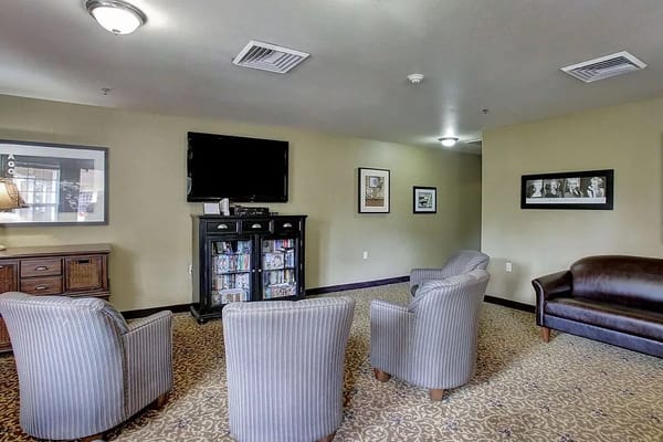 Cozy common area with seating and TV