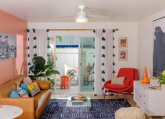 Bright living area with comfortable seating and plants