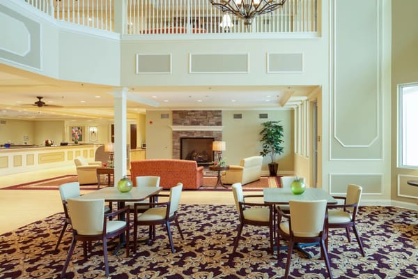 Interior common area with seating and fireplace