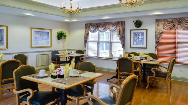Bright dining area with tables set for meals