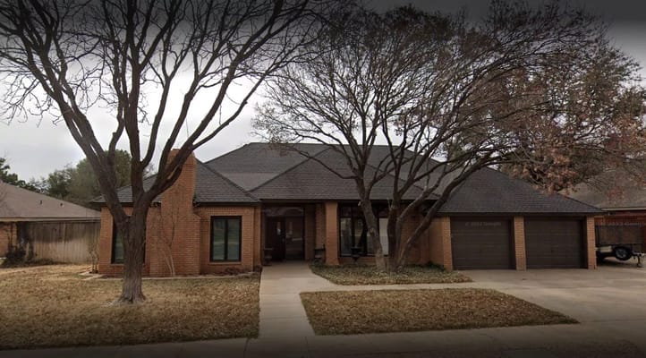 Exterior view of a single-story assisted living facility