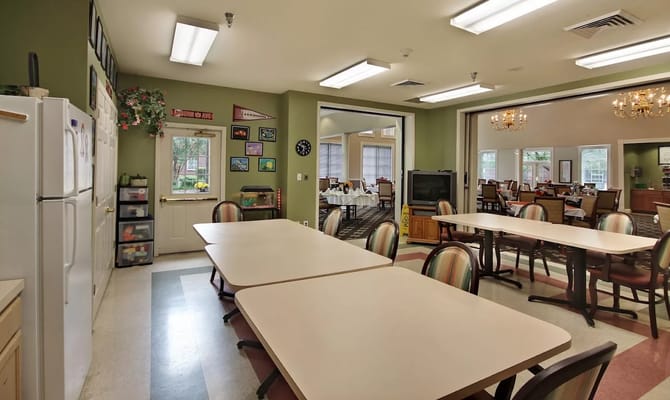 Dining area with tables and chairs set up
