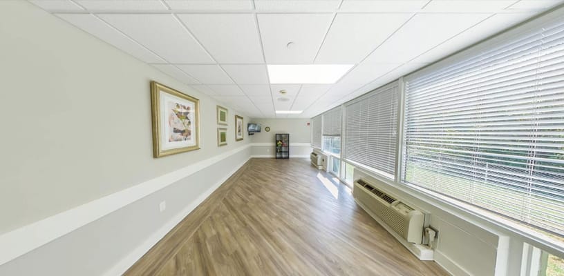 Bright hallway with natural light and framed artwork