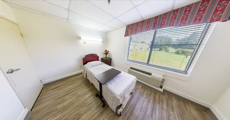 Comfortable resident room with a view of the garden