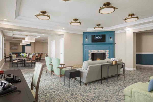 Common area lounge with seating and fireplace