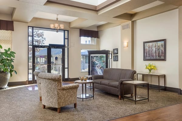 Spacious and inviting lobby with seating at Ramsey Village Continuing Care.