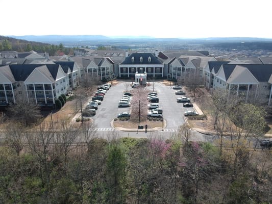 Aerial view of the Redstone Village building and parking lot