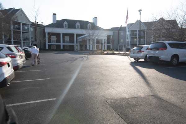 Front view of Redstone Village with parking lot