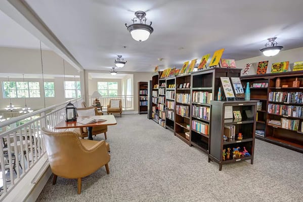 Interior view of the library with bookshelves and seating