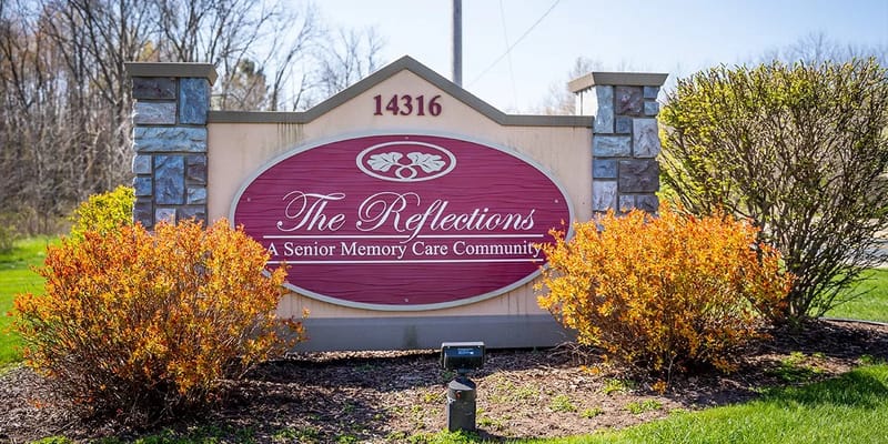Sign for Reflections Memory Care community in Battle Creek