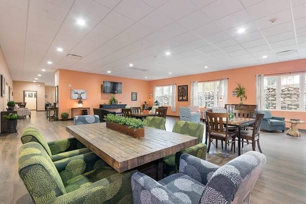 Comfortable common area with seating and tables