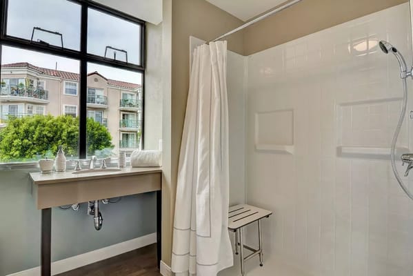 Accessible shower area in a resident room