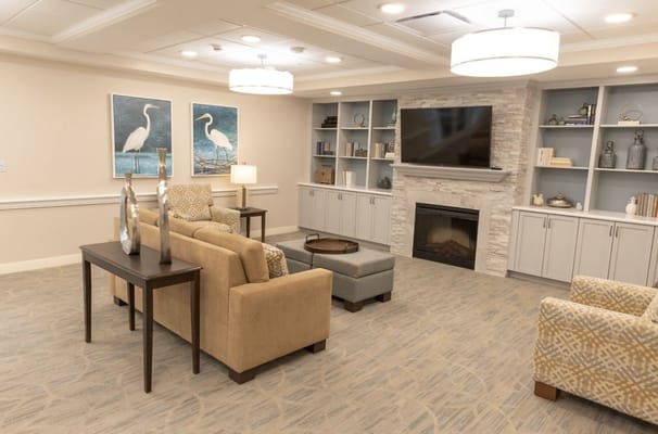 Comfortable living room with cozy seating and decorative art