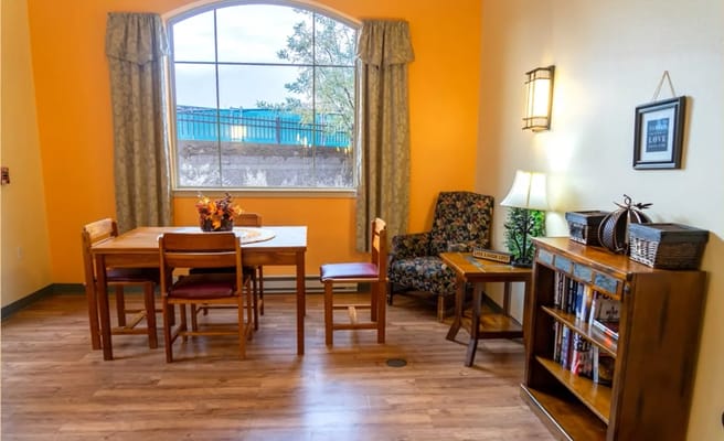 Cozy common area with seating and table